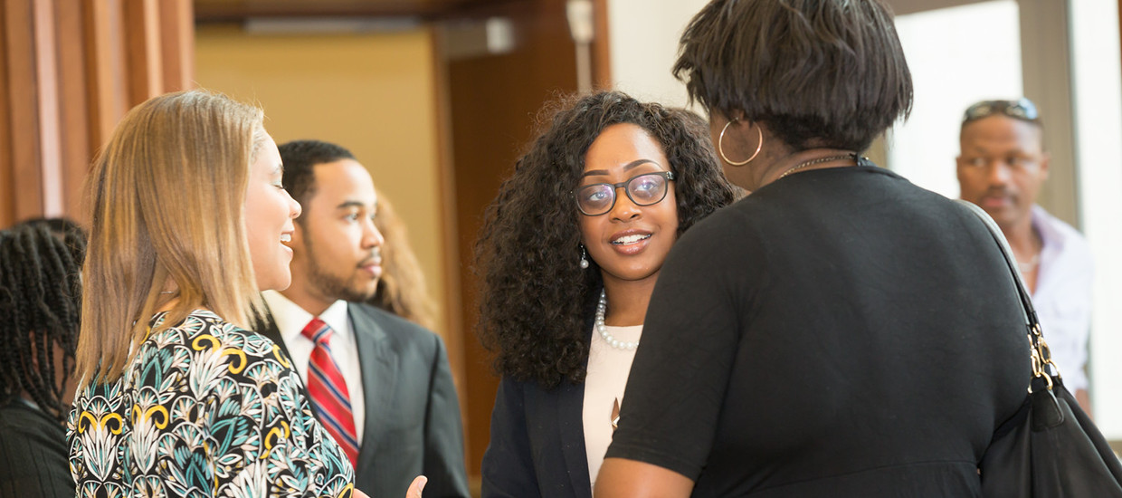 Three Woman Discussing at a scholarship reception