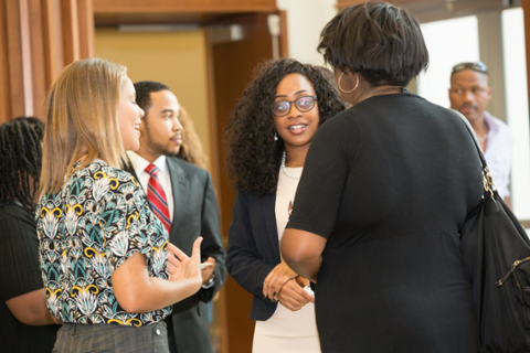 Three Woman Discussing at a scholarship reception